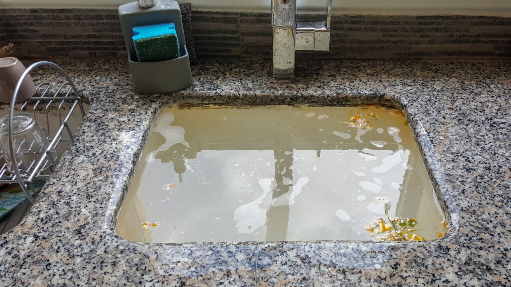 service calls for plumbing issues including this clogged sink.